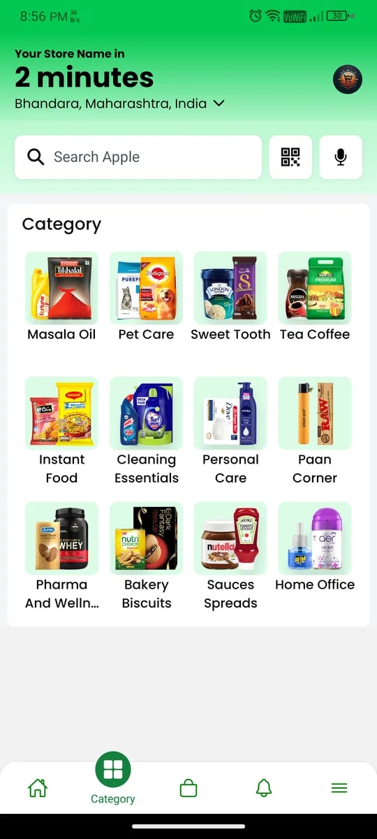 Customer app home: store name, two-minute delivery promise, search with voice and QR, category grid and a live cart bar.